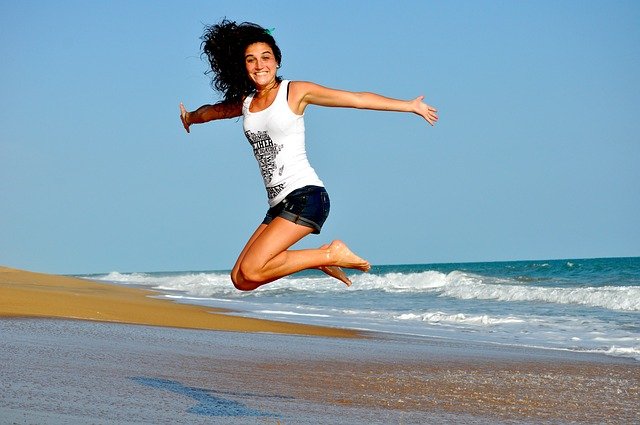 happy woman jumping